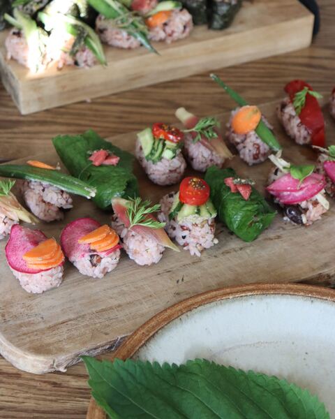 Temari sushi on a wooden board