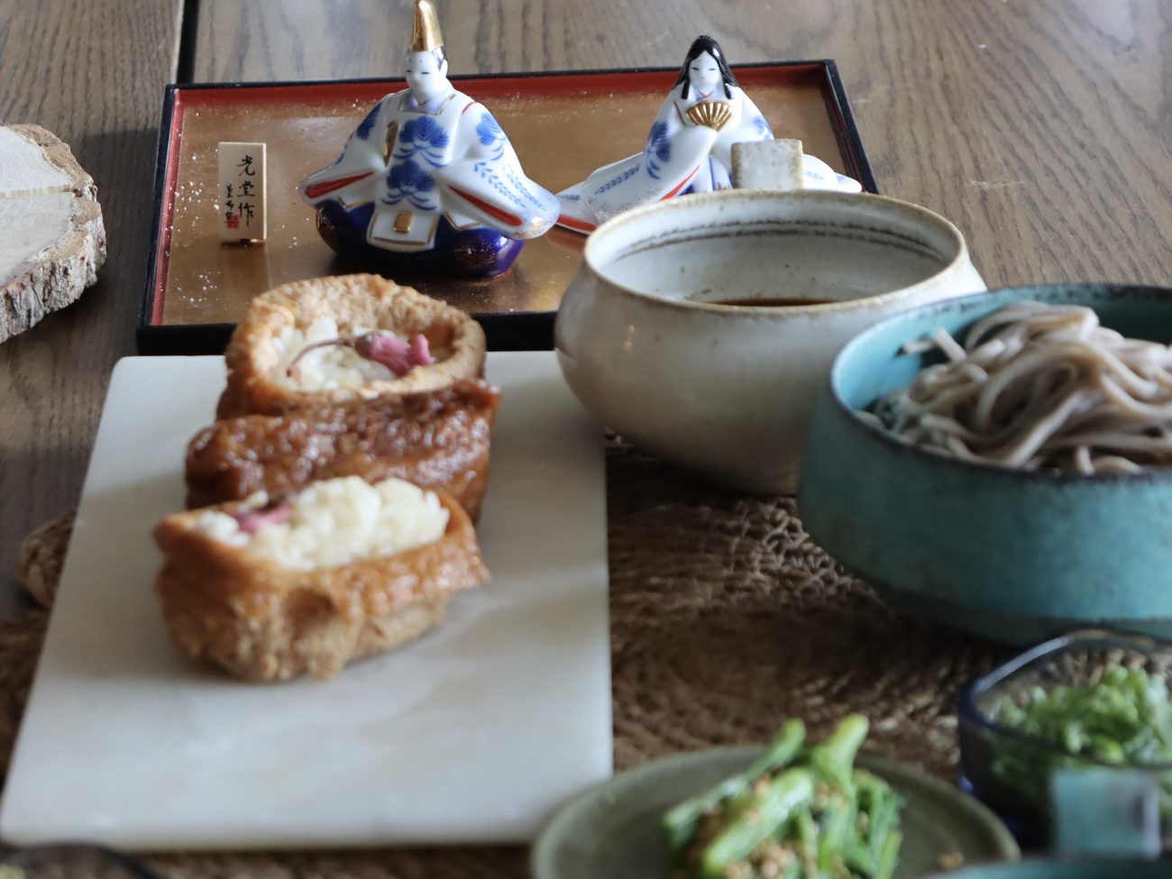 A lunch of koji-seasoned dishes served on a tray in a Tokyo kitchen